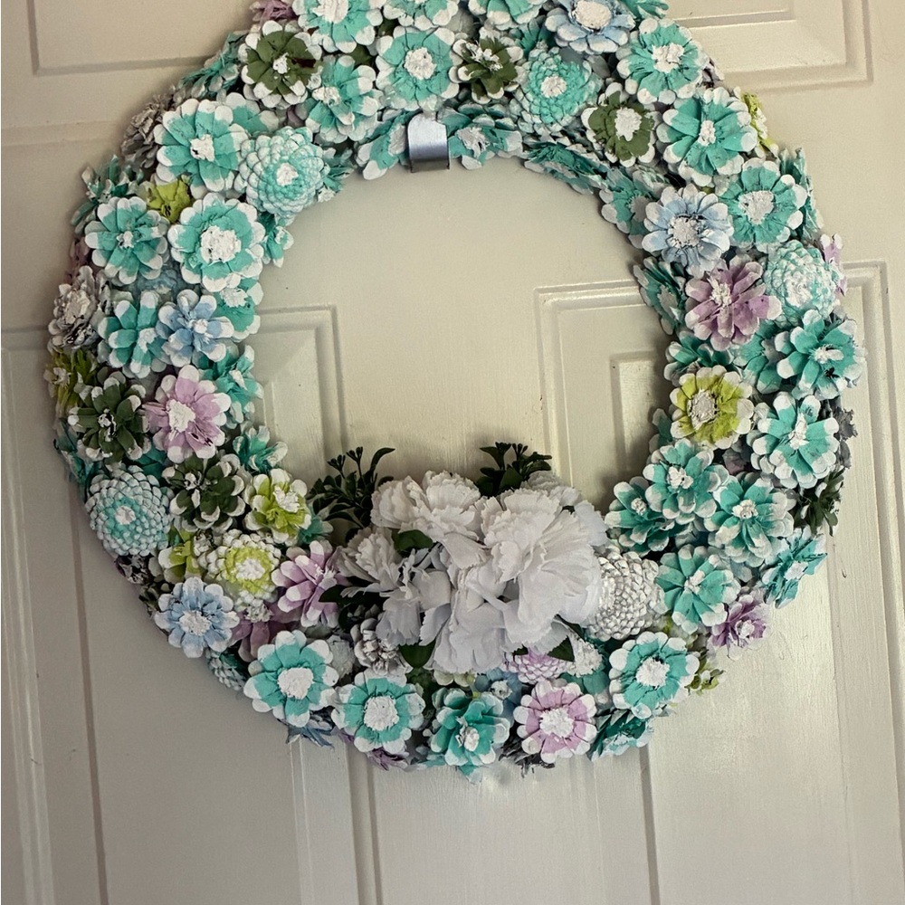 Elegant Floral Wreath with White and Pastel Blooms made with pinecones